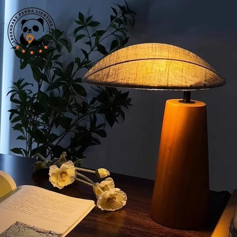 Lampe de table Limalia en bois massif avec abat-jour en verre coquillage LED, idéale pour décoration intérieure.