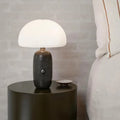Lampe de table en marbre Limalia, design postmoderne, noir et blanc, idéale pour salon ou chambre.